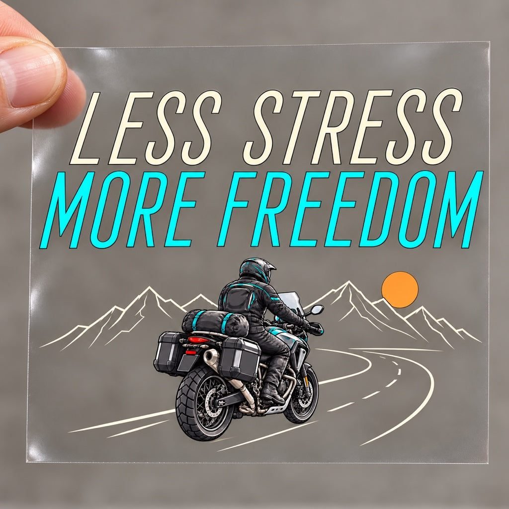 LESS STRESS MORE FREEDOM - пълноцветен стикер върху прозрачно транспортно фолио, държано с ръка