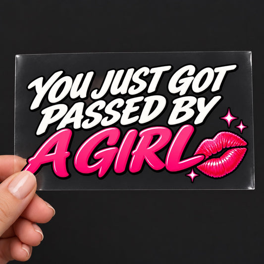 You Just Got Passed by a Girl - стикер върху прозрачно транспортно фолио, държан в ръка